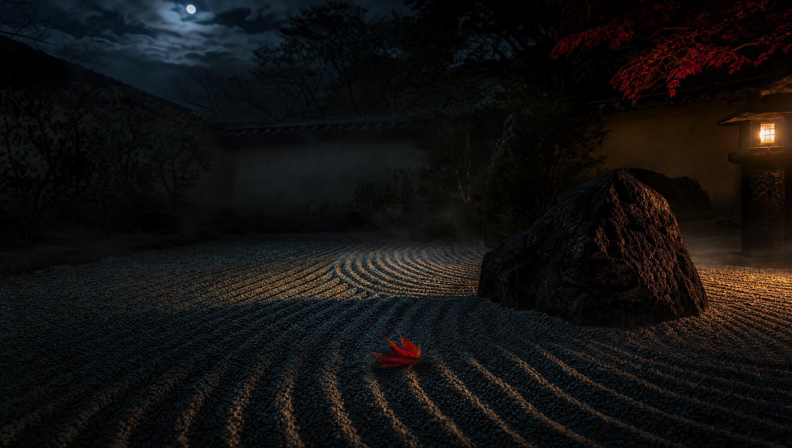 A karesansui zen garden at night, one vermillion maple leaf on raked gravel